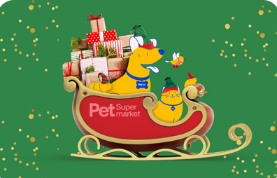 Cartoon image of a yellow dog and a reindeer in a red sleigh filled with Christmas presents and decorated with holiday ornaments, representing Pet Supermarket.